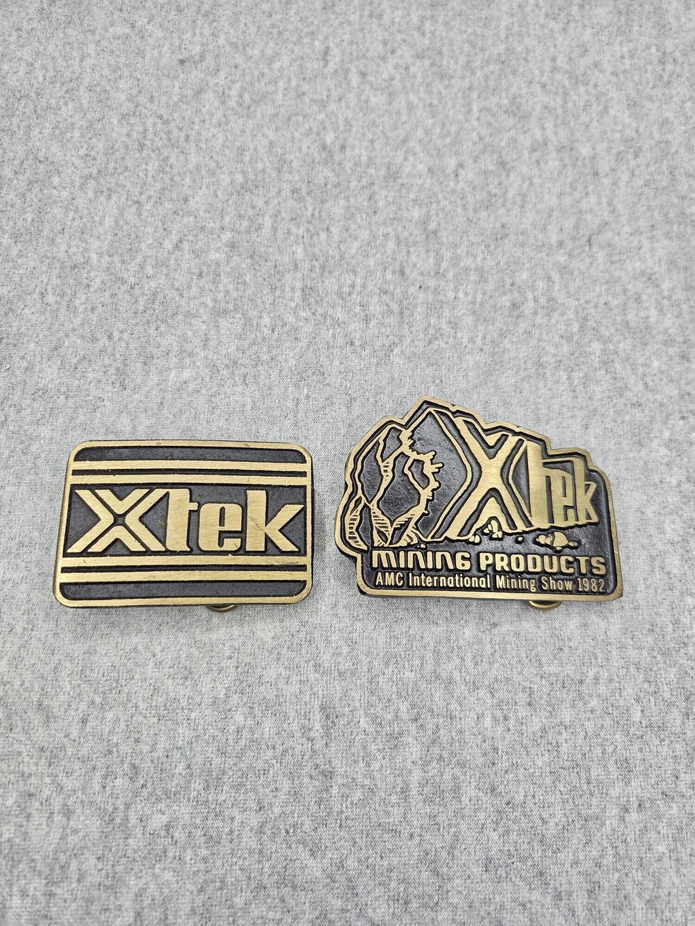 Vintage Lot of 2 Xtek Mining Products Solid Brass Advertising Belt Buckles